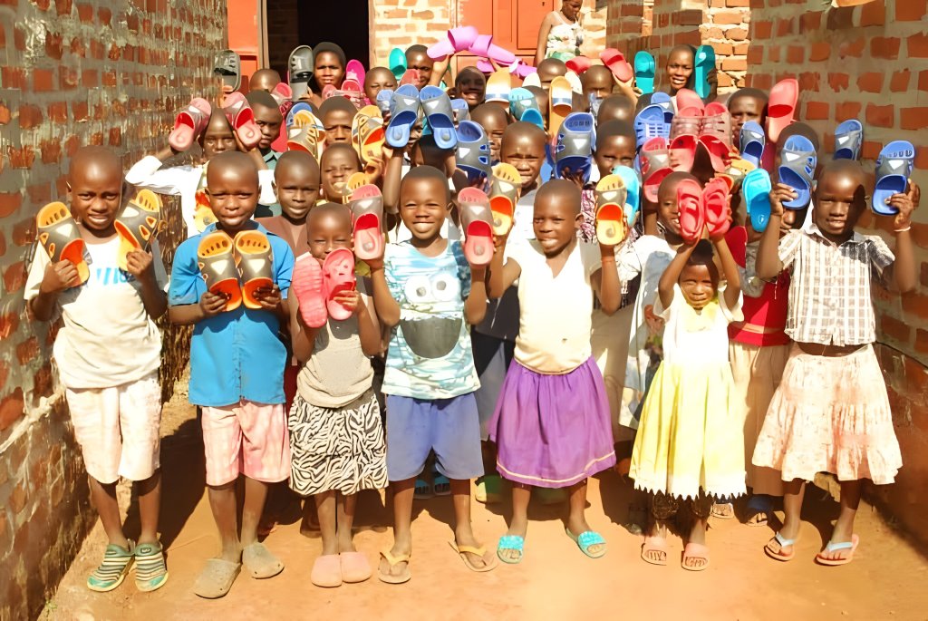 Children with new sandals from Odzież i obuwie